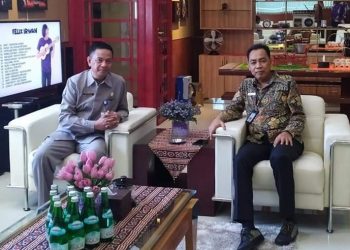 Sekda Boltim Oskar Manoppo dan Kepala BPK RI Perwakialn Sulut Karyadi, SE. MM. Ak. CA