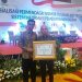 Pemkab Bolmong Menerima Piagam Penghargaan dari Kemendagri