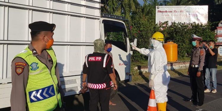 Cegah Penyebaran Covid 19, Pemkab Bolmong Terus Maksimalkan Pengawasa di Pos Perbatasan