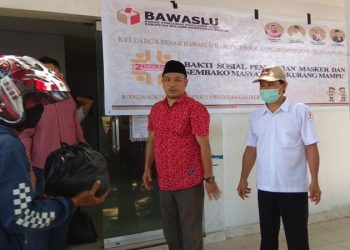 Bawaslu Bolsel Bagikan Masker dan Sembako