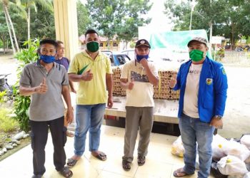 KNPI Bolmong Dampingi Penyaluran Bahan Kebutuhan Pokok