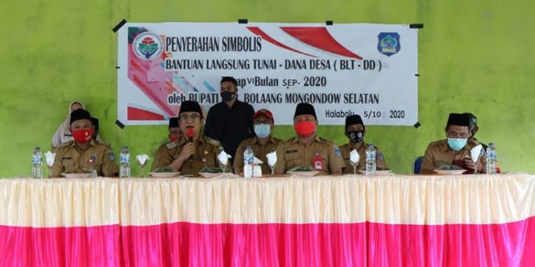 Pjs Bupati Bolsel Turun ke Kecamatan Serahkan BLT Tahap Enam dan Bantuan Bencana Non Alam