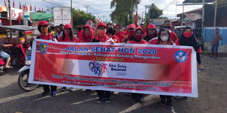 Pemkab Bolmong Memperingati Hari Guru Dengan Jalan Sehat