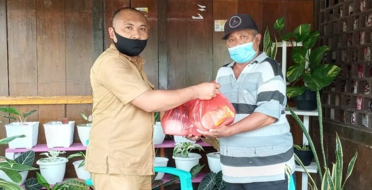 Hingga Desember, Pemkab Bolsel Masih Salurkan Bantuan Sembako Dampak Covid- 19