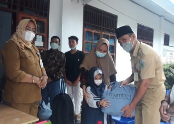 DP3A Bolmong Salurkan Bantuan Untuk Anak Yatim Dampak Covid 19