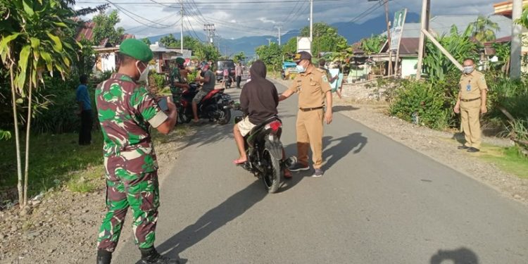 Pemeritah Kecamatan Lolayan Gandeng TNI-Polri Sweping Kartu Vaksin