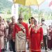 Penjabat Bupati Bolmong Bersama Ketua Tim Penggerak PKK Dijemput Adat