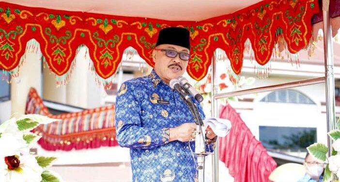 Pj Bupati Bolmong Pimpin Upacara Korpri dan Hari Lingkungan Hidup