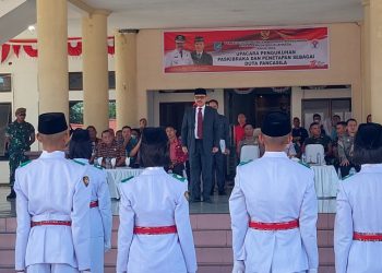 Penjabat Bupati Limi Mokodompit Kukuhkan Anggota Paskibraka Bolmong Tahun 2022