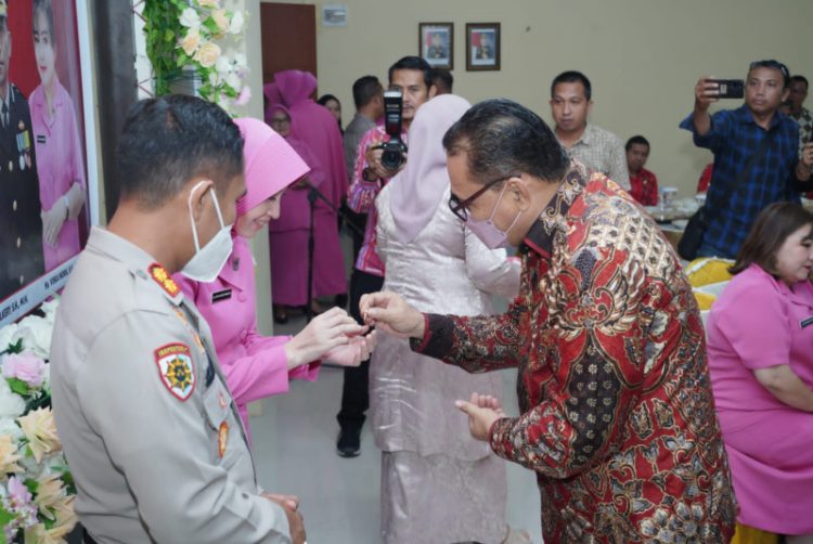 Pj Bupati Bolmong Limi Mokodompit Hadiri Pisah Sambut Kapolres