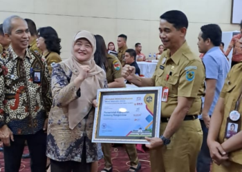 Pemkab Bolmong Raih Penghargaan BKN Award Pemanfaatan Data Sistim Informasi CAT