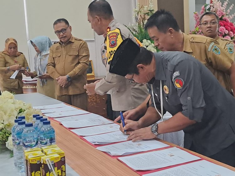 Dukung Pilkada 2024, Pemkab Bolmong Tandatangani NPHD Bersama KPU dan Bawaslu