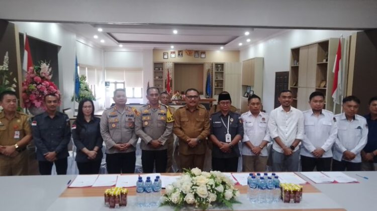 Dukung Pilkada 2024, Pemkab Bolmong Tandatangani NPHD Bersama KPU dan Bawaslu
