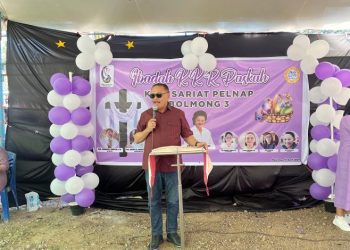 Pj Bupati Limi Mokodompit Membuka Kegiatan Paskah di Desa Pinonobatuan