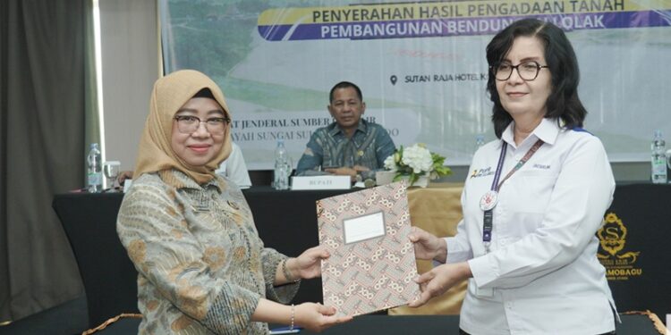 Pj Bupati Menghadiri Penyerahan Hasil Pengadaan Tanah Pembangunan Bendungan Lolak