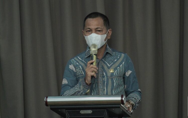 Pj Bupati Menghadiri Penyerahan Hasil Pengadaan Tanah Pembangunan Bendungan Lolak
