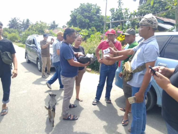 Politik Uang di Pilkada Bolmong Masif. Stiker LM – WK Jadi Bukti