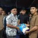 Bupati Yusra Alhabsyi Serahkan Bantuan Korban Kebakaran di Desa Bakan