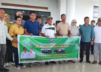 Pemkab Bolaang Mongondow Serahkan Bantuan Untuk Korban Banjir di Desa Togid