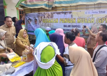 Pemkab Bolmong Gelar Pangan Murah. 2.6 Ton Beras Premium Diserbu Ibu-ibu