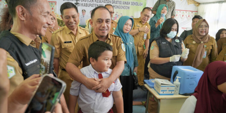 Bupati Bolmong Yusra Alhabsyi Canangkan BIAS dan CKG Untuk 7.926 Siswa