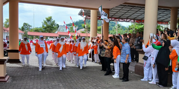 Lomba Gerak Jalan TP PKK Bolmong, Warnai HUT RI ke-80