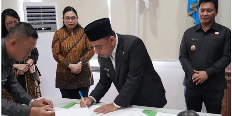 Pemkab Bolmong Tandatangani NPHD Kepada IAIN dan IAKN