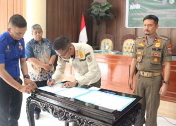 Satpol PP  Bolmong dan Kotamobagu Kolaborasi Penanggulangan Kebakaran di Wilayah Perbatasan