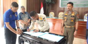 Satpol PP  Bolmong dan Kotamobagu Kolaborasi Penanggulangan Kebakaran di Wilayah Perbatasan