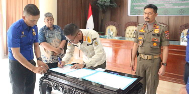 Satpol PP Bolmong dan Kotamobagu Kolaborasi Penanggulangan Kebakaran di Wilayah Perbatasan