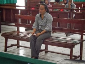Satria Mokodompit saat menjalani sidang di Tipikor 